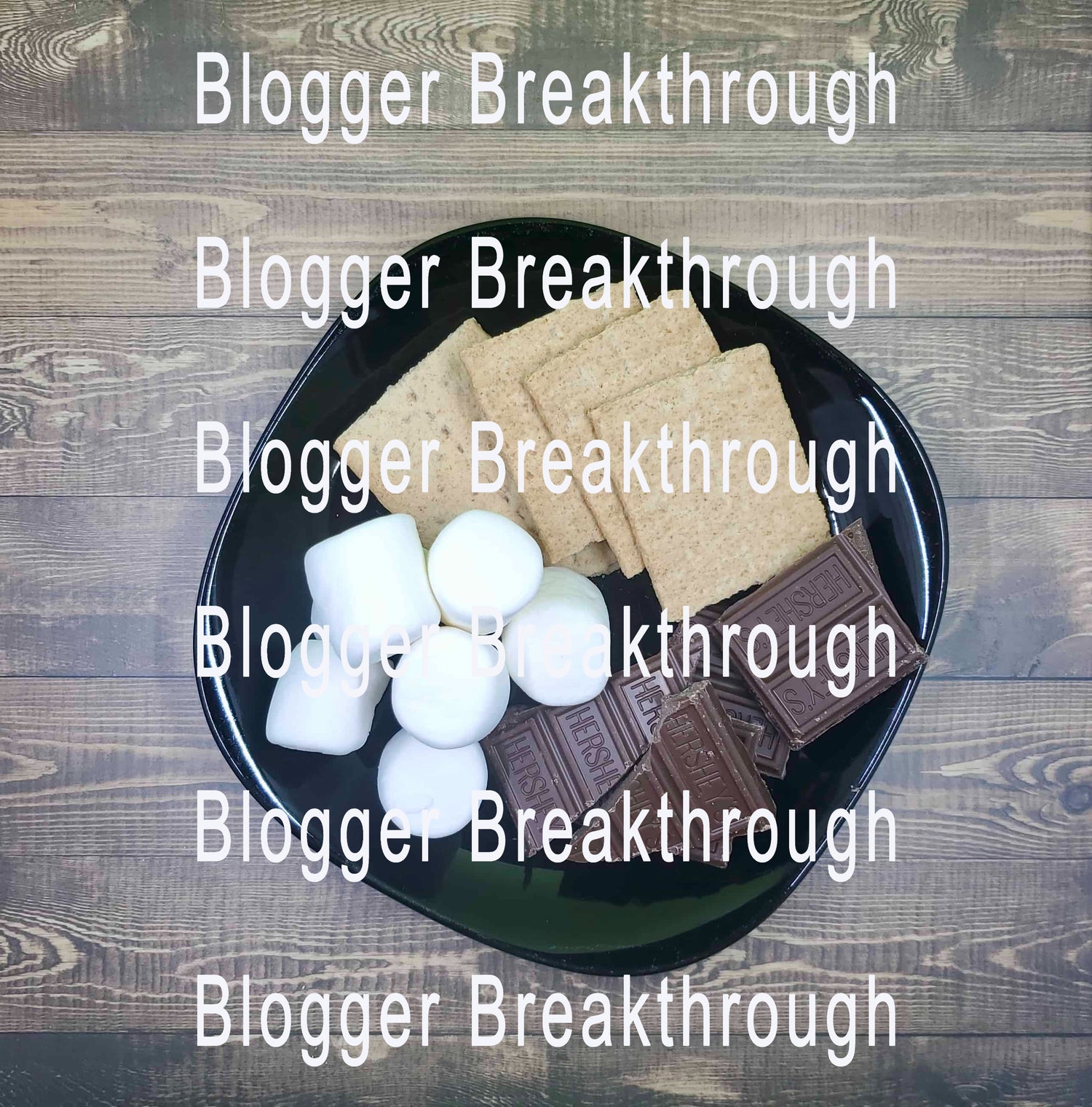 A high-quality Blogger Breakthrough Summit stock photo featuring a summer-themed plate with marshmallows, chocolate bars, and graham crackers, with the text &quot;blogger breakthrough&quot; superimposed multiple times to make your blog.
